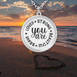 You Are Loved Strong Beautiful Brave Inspirational Silver Plated Necklace<br><div class="desc">Elevate your style with our "You Are Loved Strong Beautiful Brave" Inspirational Round Necklace. Featuring a sleek, simple, black and white, and modern typography design, this necklace is a powerful reminder of your inner strength and self-love. Whether worn for yourself or given as a thoughtful gift, this piece exudes positivity...</div>