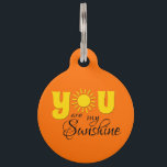 You are my sunshine pet tag<br><div class="desc">You are my sunshine text design with yellow, shiny sun decoration. It is possible to change the background color and to add different one to the design with your choice.</div>
