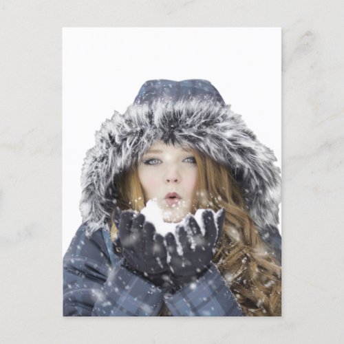 Young beautiful girl in winter postcard