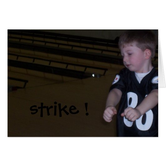 YOUNG BOY BOWLING......STRIKE (Front Horizontal)
