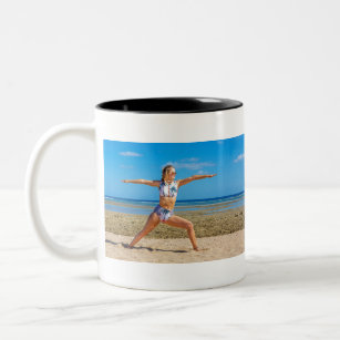 Young caucasian woman in yoga pose at beach.JPG Two-Tone Coffee Mug