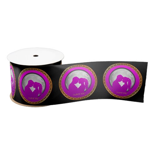 Young couple pink silhouette kissing one another satin ribbon