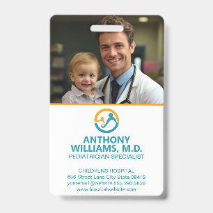 Young Doctor Holding Smiling Child Badge