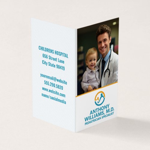 Young Doctor Holding Smiling Child Business Card