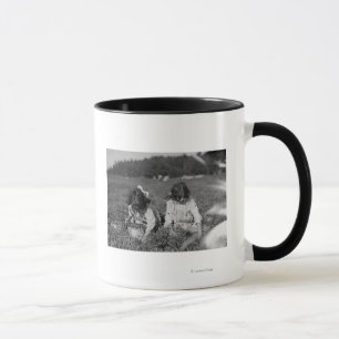 Young Girls Picking Cranberries Photograph Mug