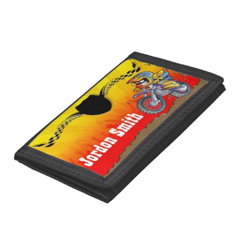 Young motocross racer tearing is up trifold wallet