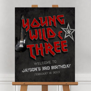Young Wild and Three Rock Welcome Sign