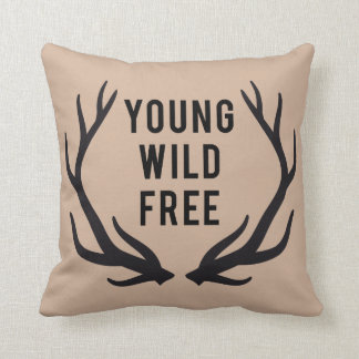 young, wild, free, text design with deer antlers throw pillow