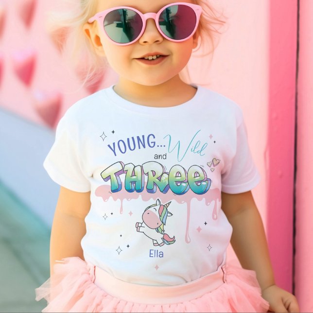 Young Wild THREE Unicorn Custom Name 3rd Birthday Toddler T-shirt (Cute magical unicorn Young Wild and THREE graffiti pink paint drips fairy tale girl birthday tshirt )