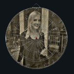 Your custom photo dartboard with darts<br><div class="desc">A blond lady wearing black.</div>