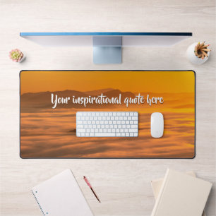 Your custom text sunrise above foggy landscape desk mat