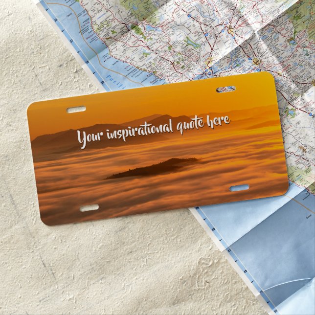 Your custom text sunrise above foggy landscape license plate (In Situ)