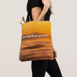 Your custom text sunrise above foggy landscape tote bag