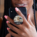 Your Dog or Cat Photo | Love with Paw Print PopSocket<br><div class="desc">This simple and adorable design features your favorite photo of your pet dog or cat,  with the word "love" using a paw print in white modern text on a black background.</div>