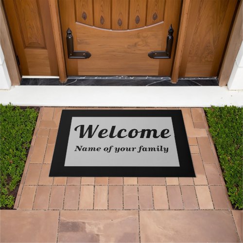 Your Family Name With Welcome on Gray Doormat