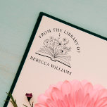 Your Name Open Book & Flowers From the Library of Self-inking Stamp<br><div class="desc">Add a personal touch to your books with the "Your Name Open Book & Flowers From the Library of" self-inking stamp. Featuring a beautifully illustrated open book adorned with delicate flowers, this custom self-inking stamp elegantly displays "From the Library of" followed by your name. Perfect for book lovers, teachers, and...</div>
