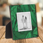 Your Photo Tropical Leaves Plaque<br><div class="desc">Made to look dimensional, a tropical leaf plant pattern creates a beautiful frame for your favorite photo on this tabletop plaque with a built-in easel. The image is put directly on the hardboard panel for a stunningly crisp image with an easy wipe clean surface. Great as a gift or to...</div>