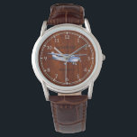 Your Text Aircraft Classic Cessna Flying Mahogany Watch<br><div class="desc">Aircraft Classic Cessna Silhouette Flying on mahogany style for any aviation enthusiast, personalize this fashion watch with two text lines. The Cessna airplane is designed to make it look like a silver chrome applique on a mahogany wood grain style print background. Here's a selection of similar custom Cessna style embroidered...</div>