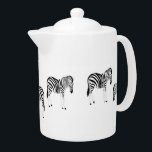 Zebra animal pattern on white teapot<br><div class="desc">Zebra animal with black and white stripes on white background pattern design.</div>
