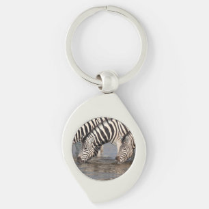 Zebras drinking keychain
