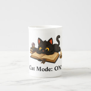 Ziggy the black cat reading a book bone china mug
