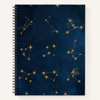Zodíaco Dorado: El Cielo Nocturno en tus Manos Notebook